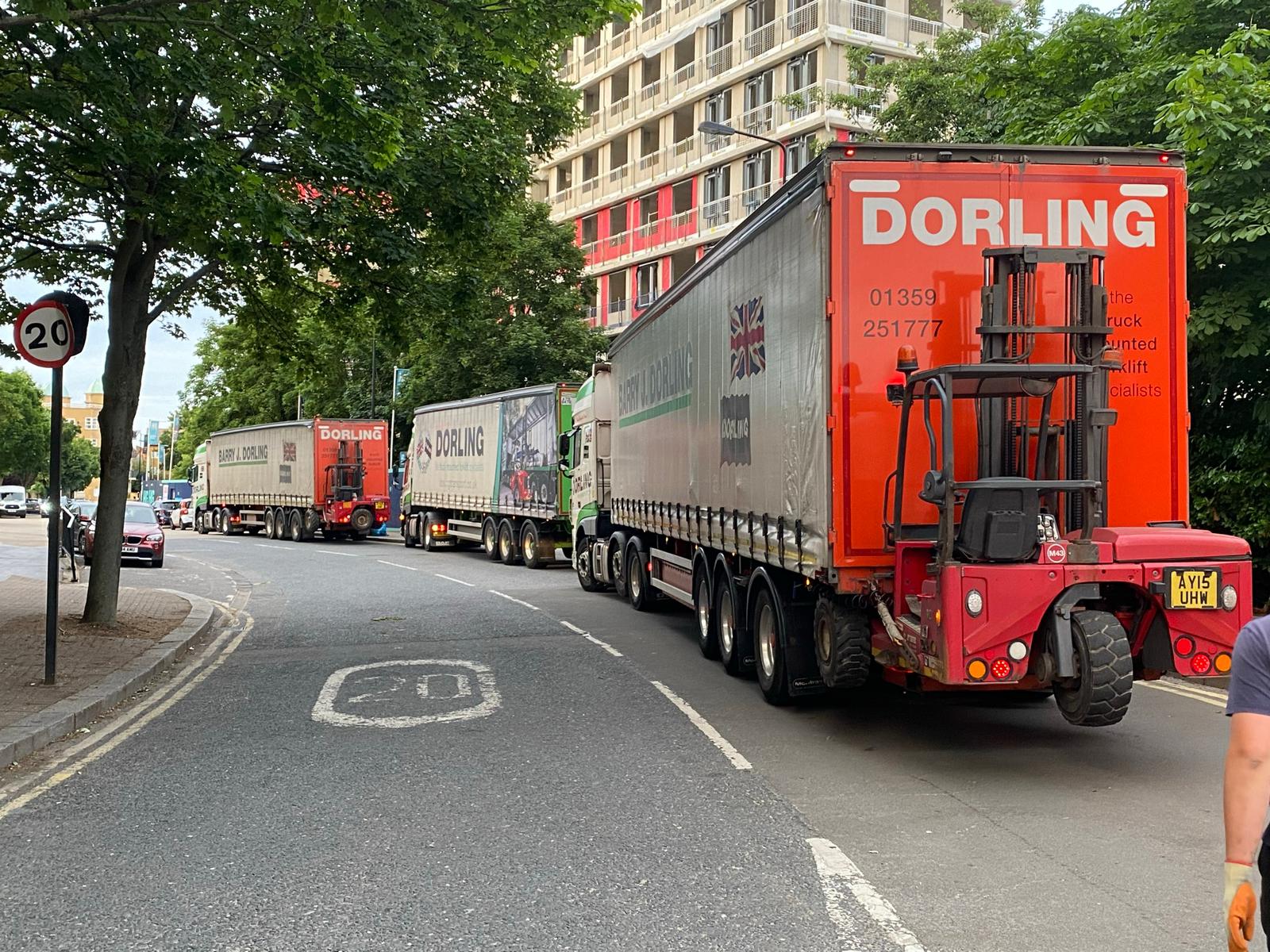 Truck Mounted Forklifts Delivering Marble to a site in London.